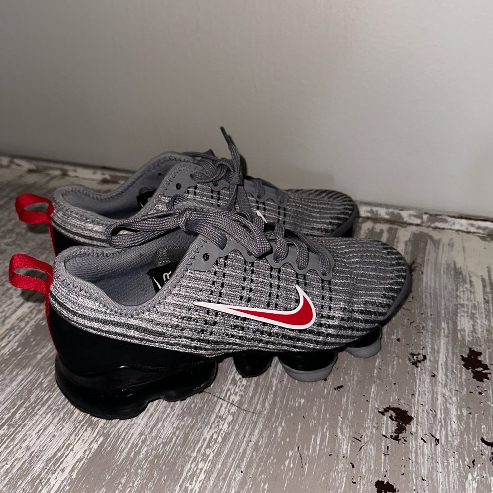 Size 4.5Y but fits woman size 6.5 nike shoes barley worn like new.